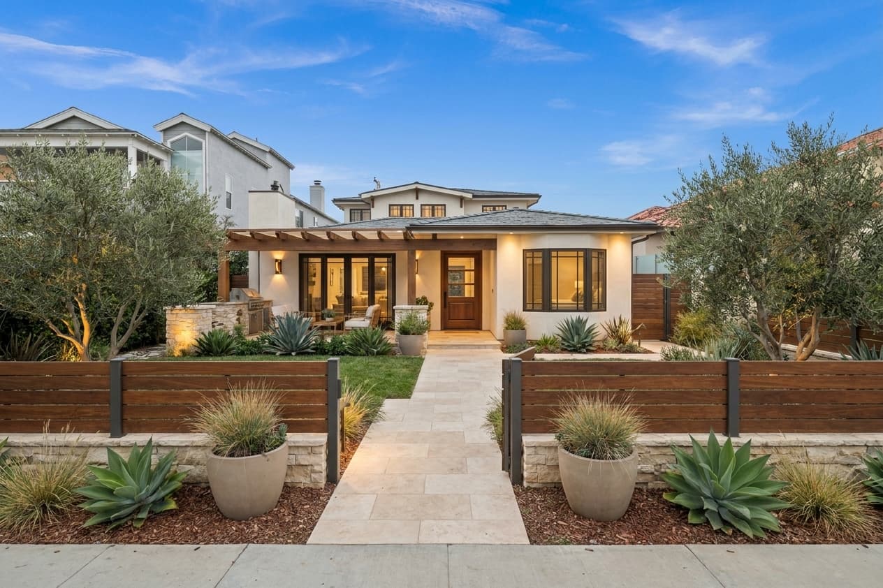 Street elevation with picket fence and courtyard