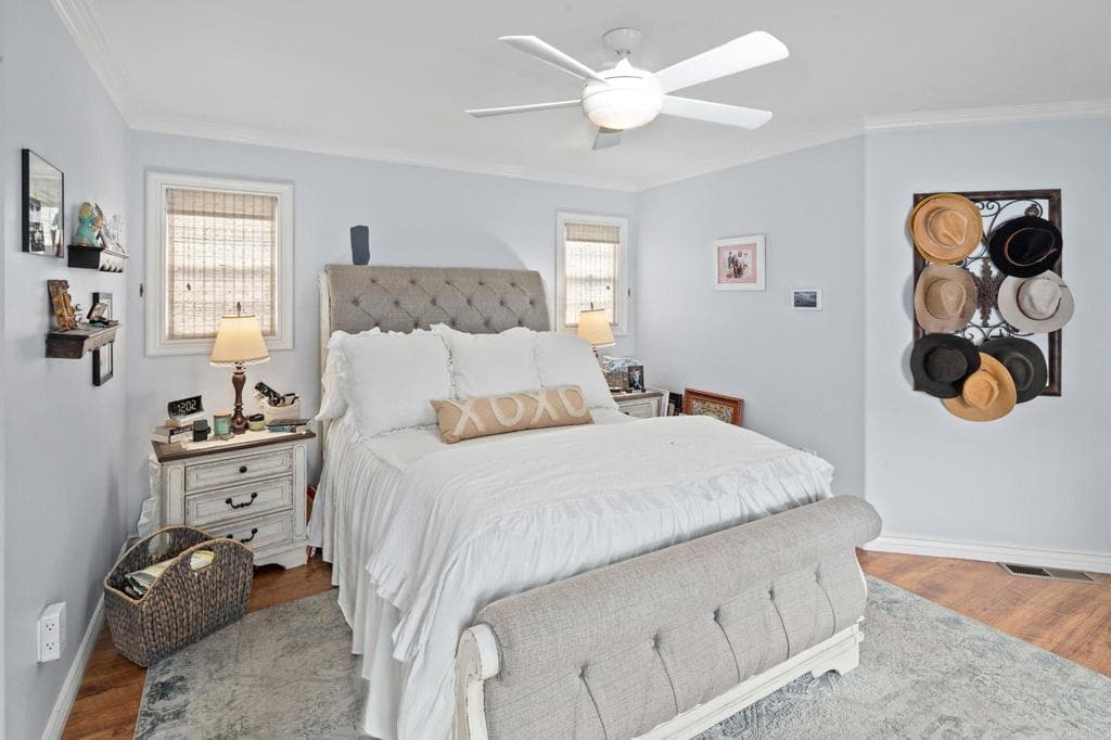 Vaulted ceilings and brass picture lights in the upper suite (as-is)